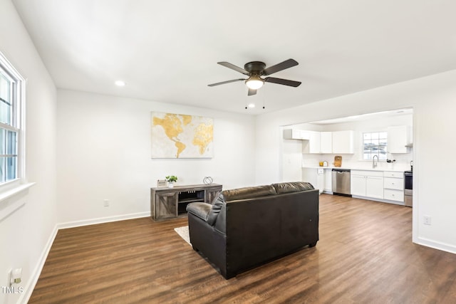 1246 NC-27, Benson, NC 27504 - living room featuring a ceiling fan, dark wood-style floors, recessed lighting, and baseboards