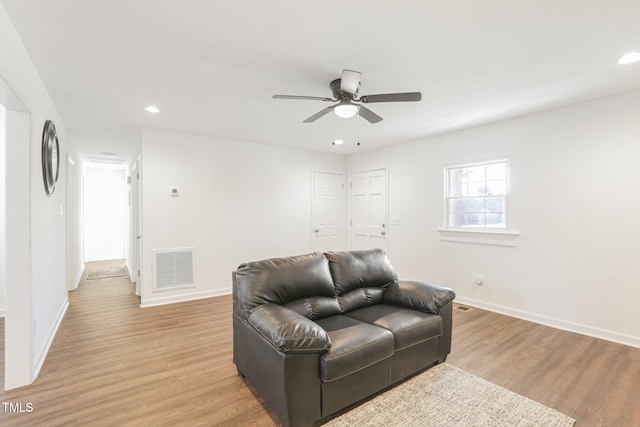 1246 NC-27, Benson, NC 27504 - sitting room with ceiling fan, baseboards, light wood-type flooring, and recessed lighting