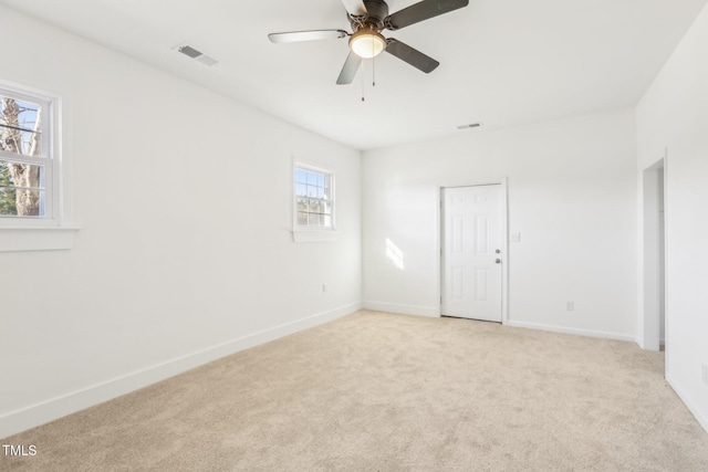 1246 NC-27, Benson, NC 27504 - empty room with light carpet, baseboards, and ceiling fan