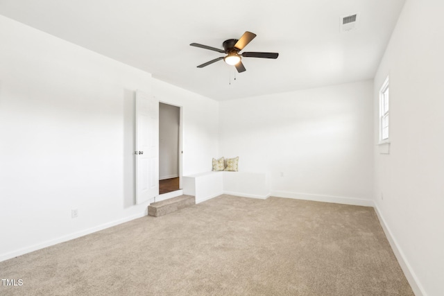 1246 NC-27, Benson, NC 27504 - empty room featuring light colored carpet, ceiling fan, and baseboards
