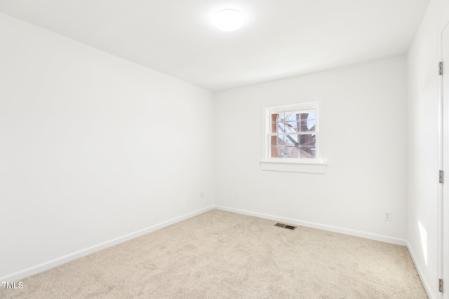 1246 NC-27, Benson, NC 27504 - spare room with light colored carpet and baseboards