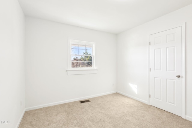 1246 NC-27, Benson, NC 27504 - carpeted spare room featuring baseboards