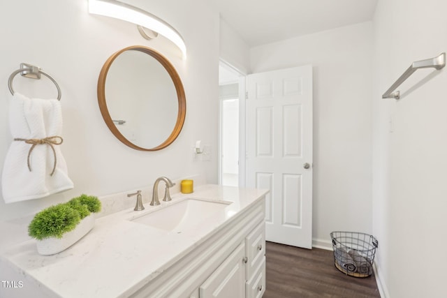 1246 NC-27, Benson, NC 27504 - bathroom with vanity, wood finished floors, and baseboards