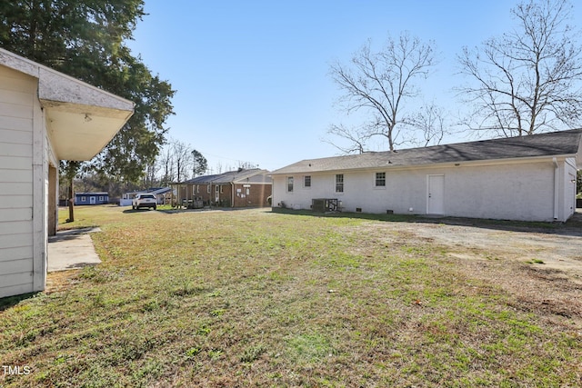 1246 NC-27, Benson, NC 27504 - view of grassy yard with central air condition unit