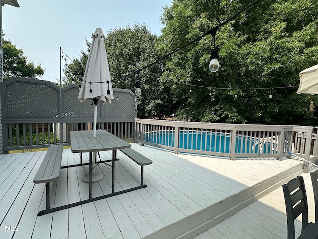 1003 Burnt Hickory Ct, Apex, NC 27502 - wooden deck with an outdoor pool
