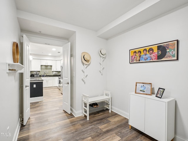 222 Glenwood Ave Unit 213, Raleigh, NC 27603 - hall featuring light wood-type flooring and recessed lighting