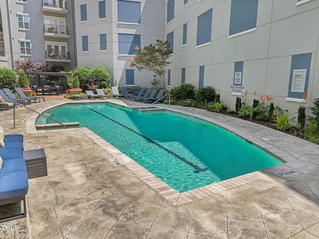 222 Glenwood Ave Unit 213, Raleigh, NC 27603 - community pool featuring a patio area