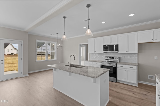 4529 Sweet Williams Ln, Wilson, NC 27896 - kitchen featuring appliances with stainless steel finishes, a sink, crown molding, light wood finished floors, and tasteful backsplash
