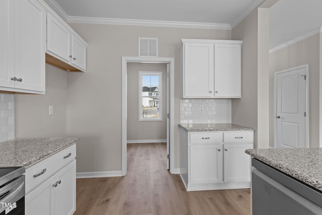 4529 Sweet Williams Ln, Wilson, NC 27896 - kitchen featuring light wood-style flooring, white cabinets, decorative backsplash, light stone counters, and ornamental molding