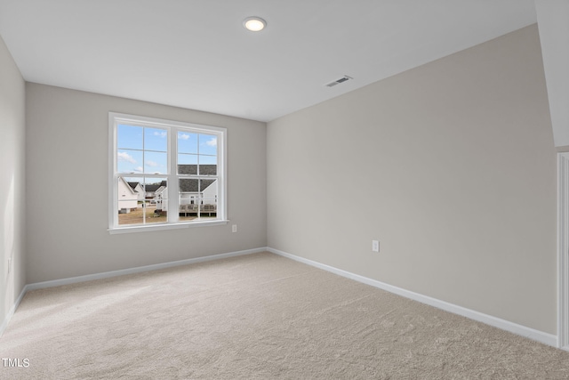 4529 Sweet Williams Ln, Wilson, NC 27896 - unfurnished room featuring baseboards and light colored carpet