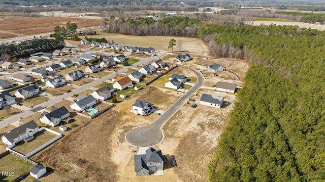 4529 Sweet Williams Ln, Wilson, NC 27896 - aerial view of property and surrounding area featuring nearby suburban area and a forest