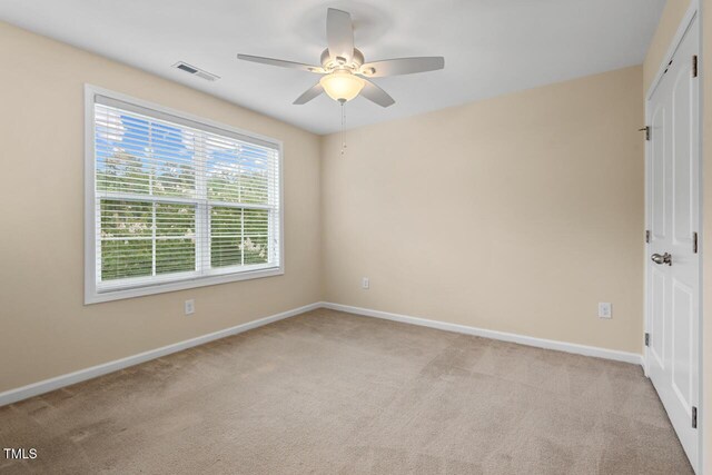 210 Strolling Way, Durham, NC 27707 - unfurnished bedroom featuring light carpet, baseboards, and a closet