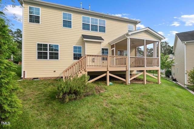 210 Strolling Way, Durham, NC 27707 - back of property with a yard, a sunroom, a deck, and stairs