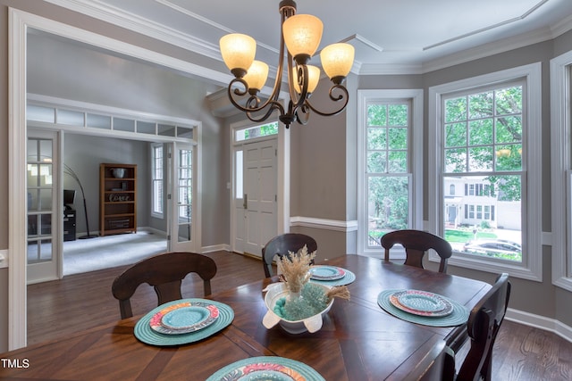 405 Widdington Ln, Cary, NC 27519 - dining space with a chandelier, wood finished floors, and crown molding