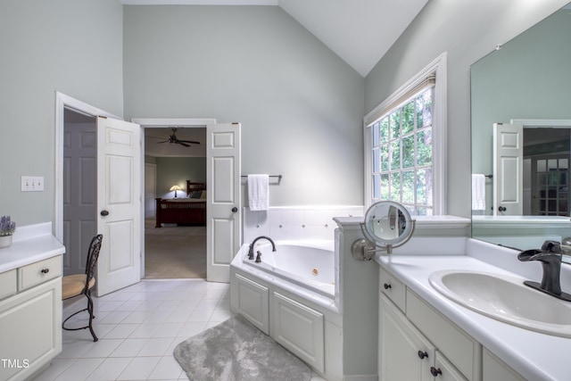 405 Widdington Ln, Cary, NC 27519 - full bath with vanity, a tub with jets, tile patterned flooring, high vaulted ceiling, and a ceiling fan