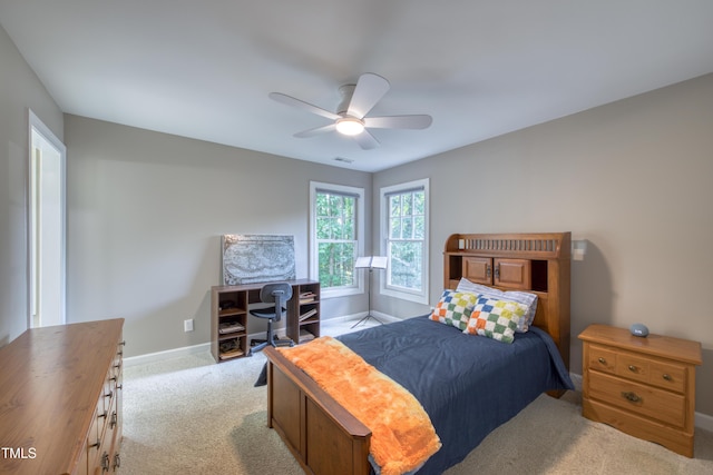 405 Widdington Ln, Cary, NC 27519 - carpeted bedroom with baseboards and a ceiling fan