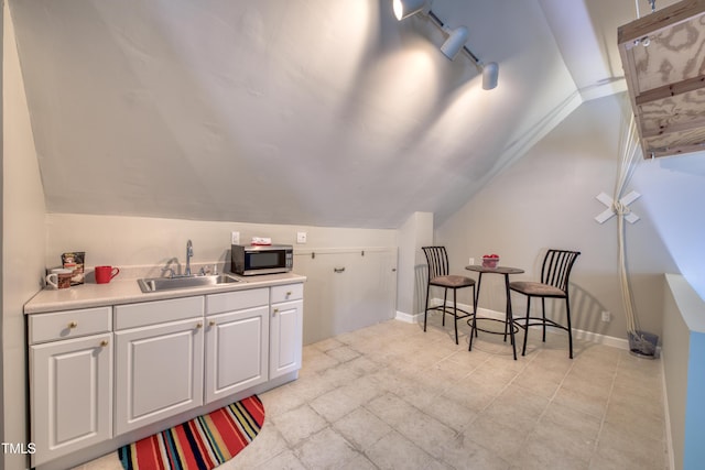 405 Widdington Ln, Cary, NC 27519 - interior space featuring a sink and vaulted ceiling