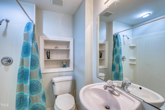 405 Widdington Ln, Cary, NC 27519 - bathroom with a sink and a shower with curtain