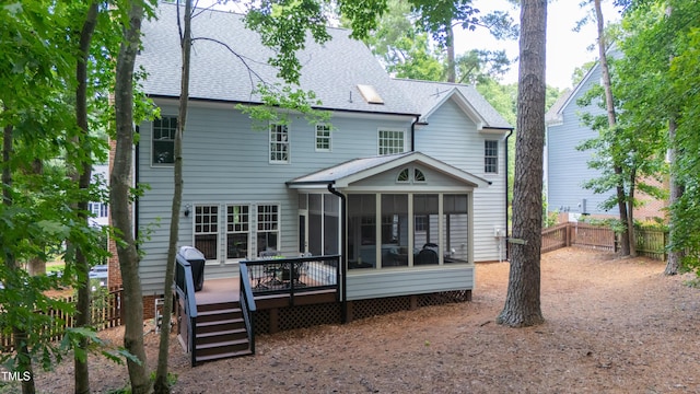 405 Widdington Ln, Cary, NC 27519 - rear view of property featuring a sunroom, roof with shingles, and a wooden deck