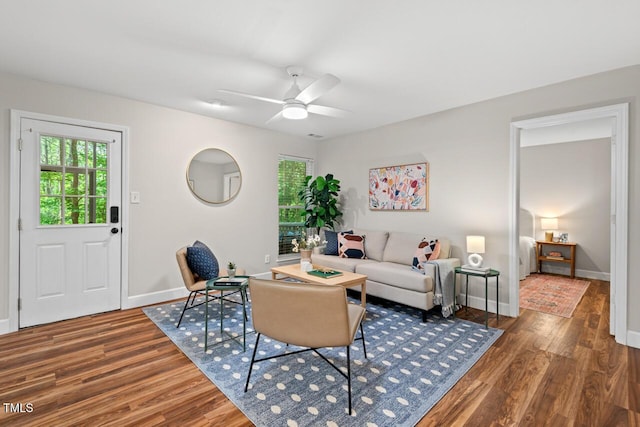 106 Choptank Ct Unit B-2, Cary, NC 27513 - living room with healthy amount of natural light, wood finished floors, ceiling fan, and baseboards