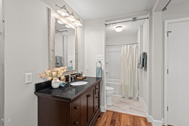 106 Choptank Ct Unit B-2, Cary, NC 27513 - full bath with vanity, toilet, shower / bathtub combination with curtain, and baseboards