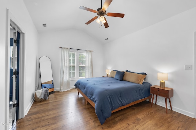 3705 Highland Creek Dr, Apex, NC 27539 - bedroom with vaulted ceiling, wood finished floors, baseboards, and a ceiling fan