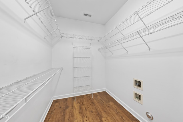 3705 Highland Creek Dr, Apex, NC 27539 - walk in closet featuring wood finished floors