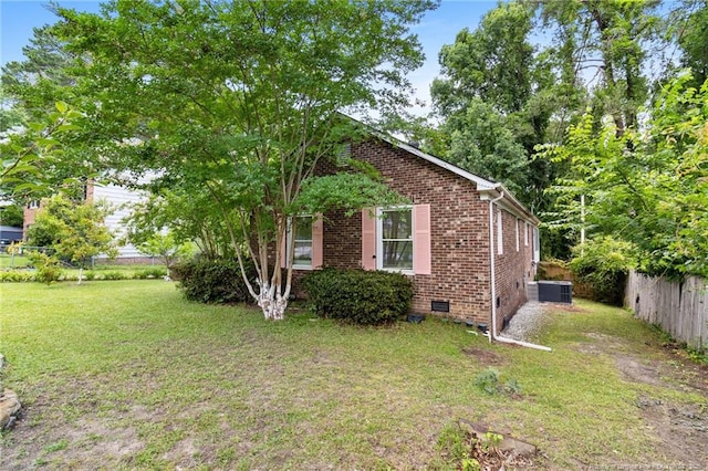 741 Ashboro St, Fayetteville, NC 28311 - view of home's exterior featuring crawl space, brick siding, and central AC unit