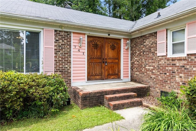 741 Ashboro St, Fayetteville, NC 28311 - view of exterior entry featuring brick siding