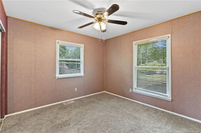 741 Ashboro St, Fayetteville, NC 28311 - carpeted spare room with a ceiling fan