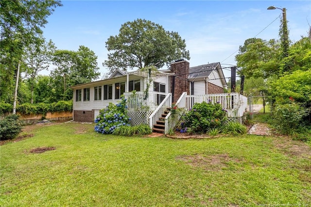 741 Ashboro St, Fayetteville, NC 28311 - back of house with a deck, crawl space, and a chimney