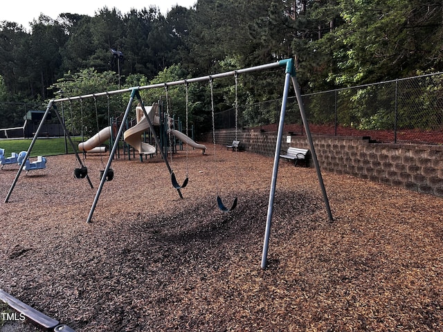 1527 Haywards Heath Ln, Apex, NC 27502 - community playground featuring a forest view