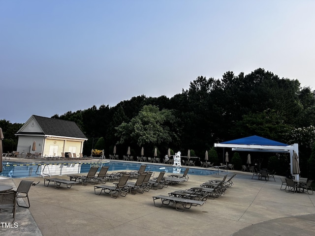 1527 Haywards Heath Ln, Apex, NC 27502 - community pool featuring a gazebo and a patio area