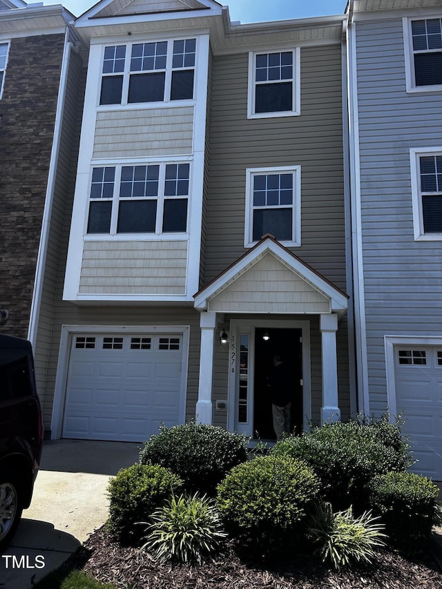 1527 Haywards Heath Ln, Apex, NC 27502 - view of property with an attached garage and driveway