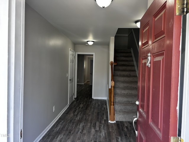 1527 Haywards Heath Ln, Apex, NC 27502 - foyer entrance with dark wood-type flooring, stairs, and baseboards