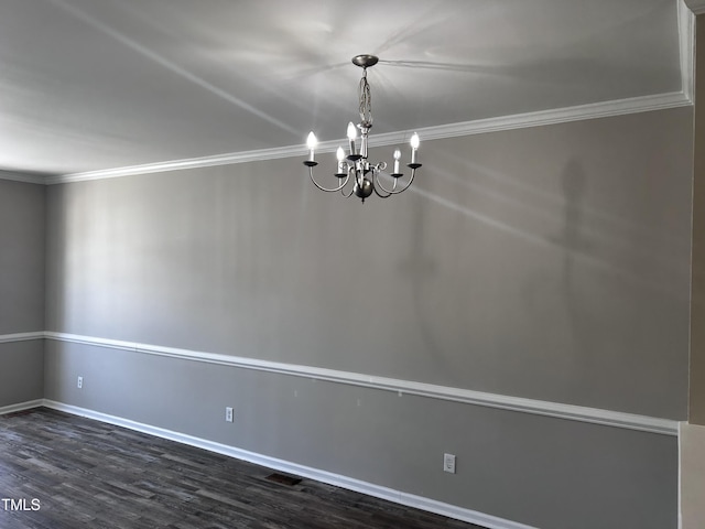 1527 Haywards Heath Ln, Apex, NC 27502 - unfurnished room with a chandelier, ornamental molding, dark wood-style floors, and baseboards