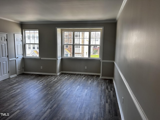 1527 Haywards Heath Ln, Apex, NC 27502 - unfurnished room with dark wood-type flooring, healthy amount of natural light, ornamental molding, and baseboards