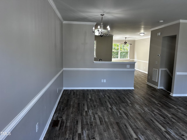 1527 Haywards Heath Ln, Apex, NC 27502 - spare room with a chandelier, dark wood-style flooring, baseboards, and ornamental molding