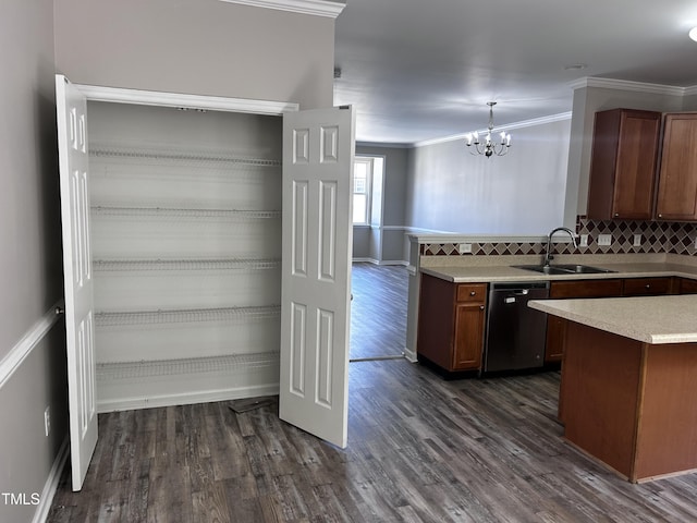 1527 Haywards Heath Ln, Apex, NC 27502 - kitchen with dishwasher, a sink, light countertops, a chandelier, and dark wood-type flooring