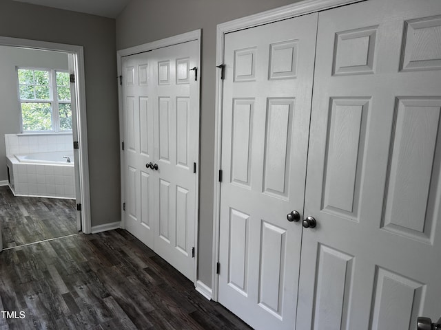 1527 Haywards Heath Ln, Apex, NC 27502 - corridor with dark wood-type flooring and baseboards
