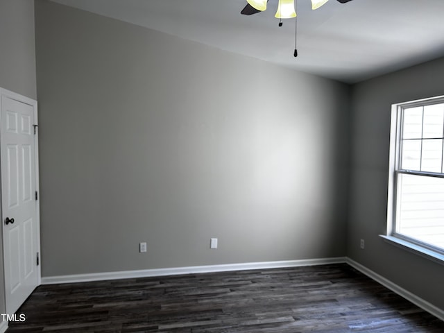 1527 Haywards Heath Ln, Apex, NC 27502 - unfurnished room featuring a ceiling fan, dark wood-style flooring, and baseboards