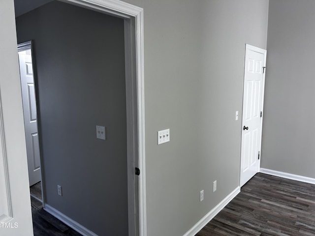 1527 Haywards Heath Ln, Apex, NC 27502 - hall with dark wood-style flooring and baseboards
