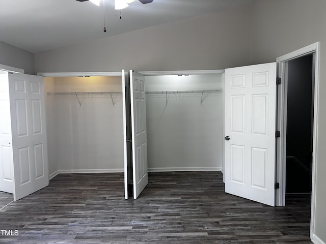1527 Haywards Heath Ln, Apex, NC 27502 - unfurnished bedroom with multiple closets, wood finished floors, and baseboards