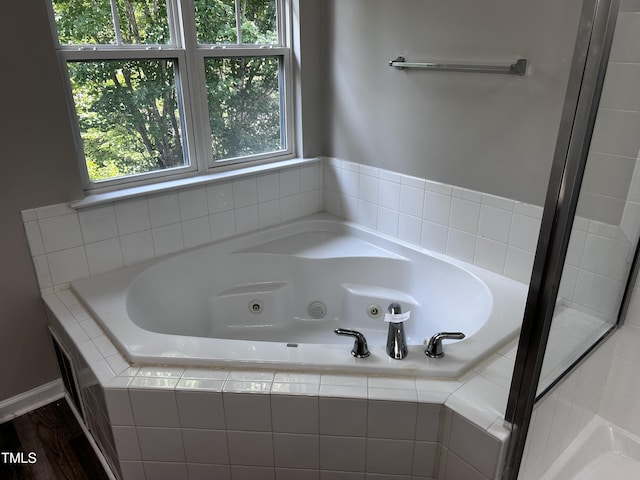 1527 Haywards Heath Ln, Apex, NC 27502 - bathroom with a tub with jets