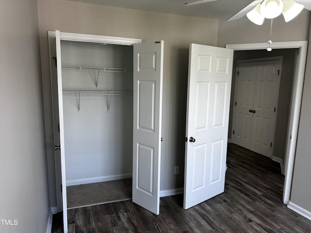 1527 Haywards Heath Ln, Apex, NC 27502 - unfurnished bedroom with dark wood finished floors, baseboards, and a closet