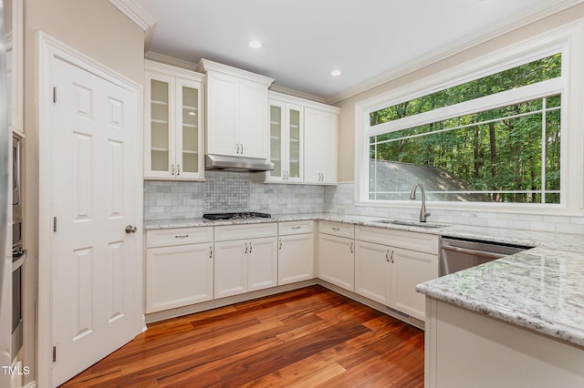 7604 Copper Creek Ct, Wake Forest, NC 27587 - kitchen with a sink, ornamental molding, appliances with stainless steel finishes, wood finished floors, and decorative backsplash