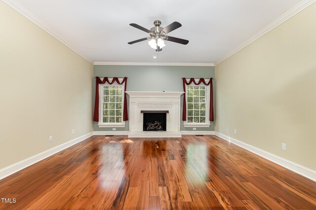 7604 Copper Creek Ct, Wake Forest, NC 27587 - unfurnished living room with crown molding, wood-type flooring, baseboards, a brick fireplace, and a ceiling fan