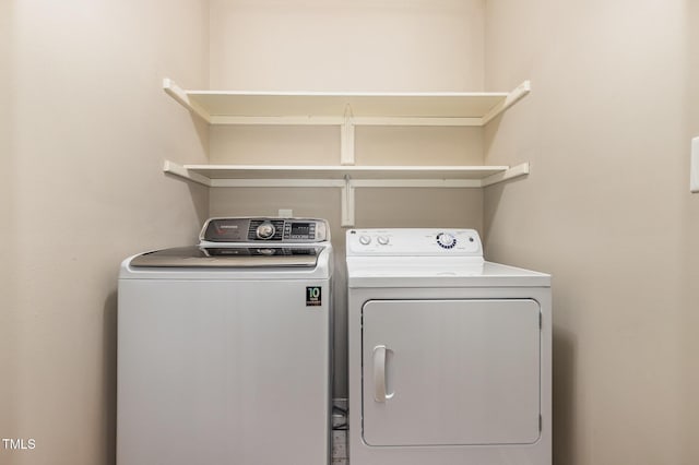 7604 Copper Creek Ct, Wake Forest, NC 27587 - laundry room featuring washing machine and dryer