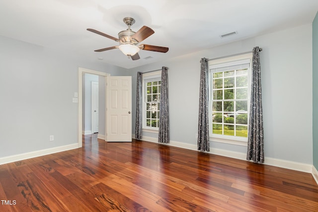 7604 Copper Creek Ct, Wake Forest, NC 27587 - spare room with healthy amount of natural light, wood finished floors, ceiling fan, and baseboards