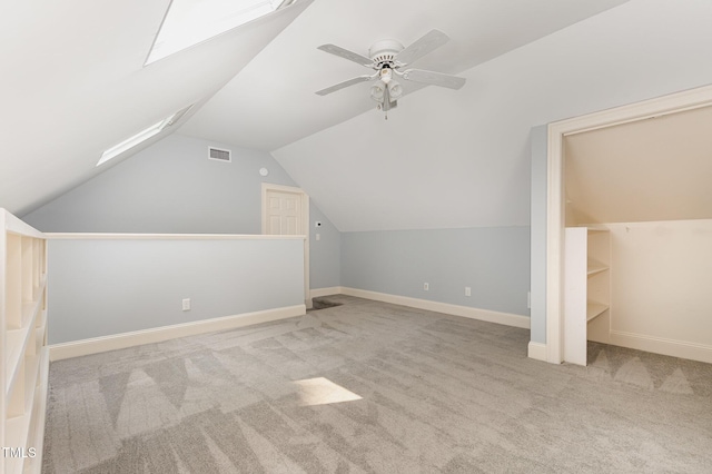 7604 Copper Creek Ct, Wake Forest, NC 27587 - bonus room with carpet floors, lofted ceiling, a skylight, ceiling fan, and baseboards